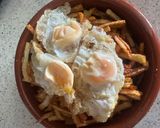 Foto del paso 6 de la receta: Nido de patatas paja con huevos de codorniz y crujiente de jamón