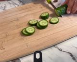 A picture of step 2 of Bagel with Tomato and Cucumber🥯🥒🍅.