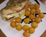 Foto del paso 4 de la receta: Pechuga rellena con papas duquesas 😋