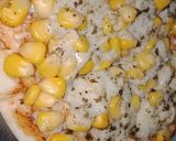 A picture of step 4 of Cheesy Corn pizza.