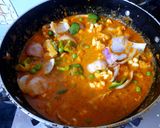 A picture of step 9 of Veg kolapuri.