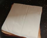 A picture of step 1 of Noodles cheese sandwich.