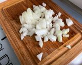 Une image de l'étape 4 de Aubergine et poivron aux tomates confites, coriandre et épices.