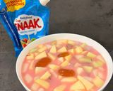 Foto langkah ke 4 dari resep Es Campur Buah Kolang Kaling Melon Apel Pear Nata de Coco kental manis.
