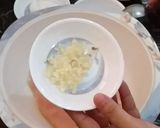 A picture of step 1 of Cheesy Chicken with spaghetti & potato wedges.