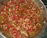 A picture of step 7 of Sliced Red Chili Pickle.