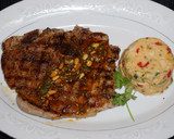 Foto del paso 4 de la receta: Chuletas de cerdo grilladas con chimichurri de piñonesy timbal de porotos blancos