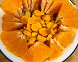 A picture of step 1 of Turmeric orange juice.