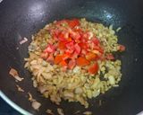 A picture of step 2 of Masoor Dal with Tomato and Curry Leaf Tadka.