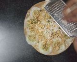 A picture of step 4 of Sandwich pizza from leftover Roti.