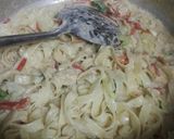 A picture of step 7 of Alfredo fusion pasta.