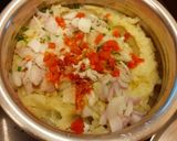 A picture of step 2 of Aloo Bharta.