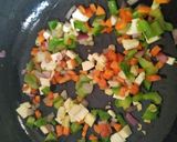 A picture of step 3 of Schezwan fried quinoa.