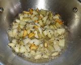 A picture of step 2 of Raw mango,garlic pickle.