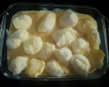 A picture of step 4 of Snow Ball Custard Pudding.