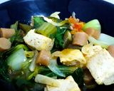 Foto langkah ke 9 dari resep Tumis Pakcoy Siram Tahu Sosis Ayam.