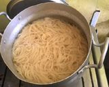 A picture of step 1 of Singaporean rice with gravy sauce.