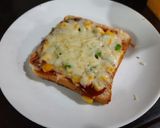 A picture of step 3 of Cheesy toast.
