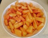 A picture of step 2 of Muskmelon and papaya salad.