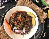 A picture of step 5 of Golbari Kosha Mangsho.