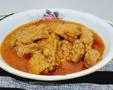 A picture of step 7 of Murg 12 masala.