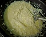 A picture of step 3 of Coconut Chandrapuli.