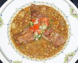 A picture of step 10 of Cajun pork spare ribs and lentils.
