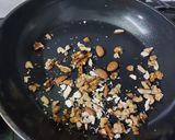 A picture of step 1 of Curd Makhana with Apple and Dry Fruits.