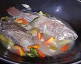 Foto langkah ke 3 dari resep Ikan Kuah Asam / Asang (Manado Cuisine).