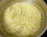 A picture of step 1 of Aloo Jhuri Bhaja.