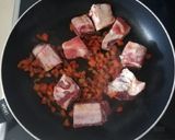 Foto del paso 2 de la receta: Arroz con costillas y garbanzos