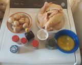 Foto del paso 1 de la receta: Pollo al horno con papitas, especias y mantequilla