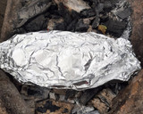 Foto del paso 7 de la receta: Mojarra Empapelada a las Brazas