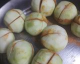 A picture of step 2 of Stuffed tinde masala.