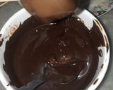 A picture of step 4 of 1 bite chocolatey marshmallow pops.
