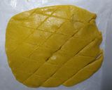 A picture of step 13 of Kesar kaju katli/kaju roll.