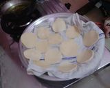 A picture of step 8 of Golgappa with spicy potato-chana masala and spicy flavored water.
