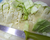 Foto del paso 4 de la receta: Guisado de pollo recuperado y garrofón