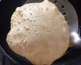 A picture of step 8 of Mango Kheer and Puri.