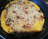 Une image de l'étape 2 de Omelette aux champignons et emmental.
