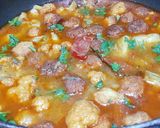 A picture of step 11 of Phulkopi,aloo diye Chhanar Dalna.