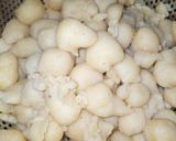 A picture of step 1 of Hyderabadi Dahi Phulki.