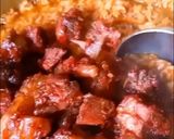 A picture of step 3 of Asun jollof.