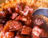 A picture of step 3 of Asun jollof.