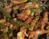 A picture of step 8 of #Tiffin box bhindi with French fries.