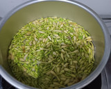 Foto langkah ke 1 dari resep Oseng bunga pepaya tahu teri.