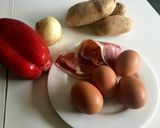 A picture of step 1 of Spanish Potato Omelette with Onion, Red Pepper, and Ham.