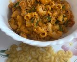 A picture of step 14 of Creamy Cheesy Schezwan Pasta.