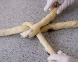 A picture of step 10 of Soft Chewy Braided Raisin Bread.