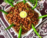 A picture of step 7 of Steam-Fried Wheat and Black Chickpea Masala Ghughri.